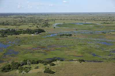 Rain and early flood water around Selinda Camp (camp in tree island at middle-left)